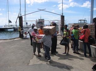 Image #29 - Hurricane Tomas Relief Effort (Carrying the goods to the distribution point)